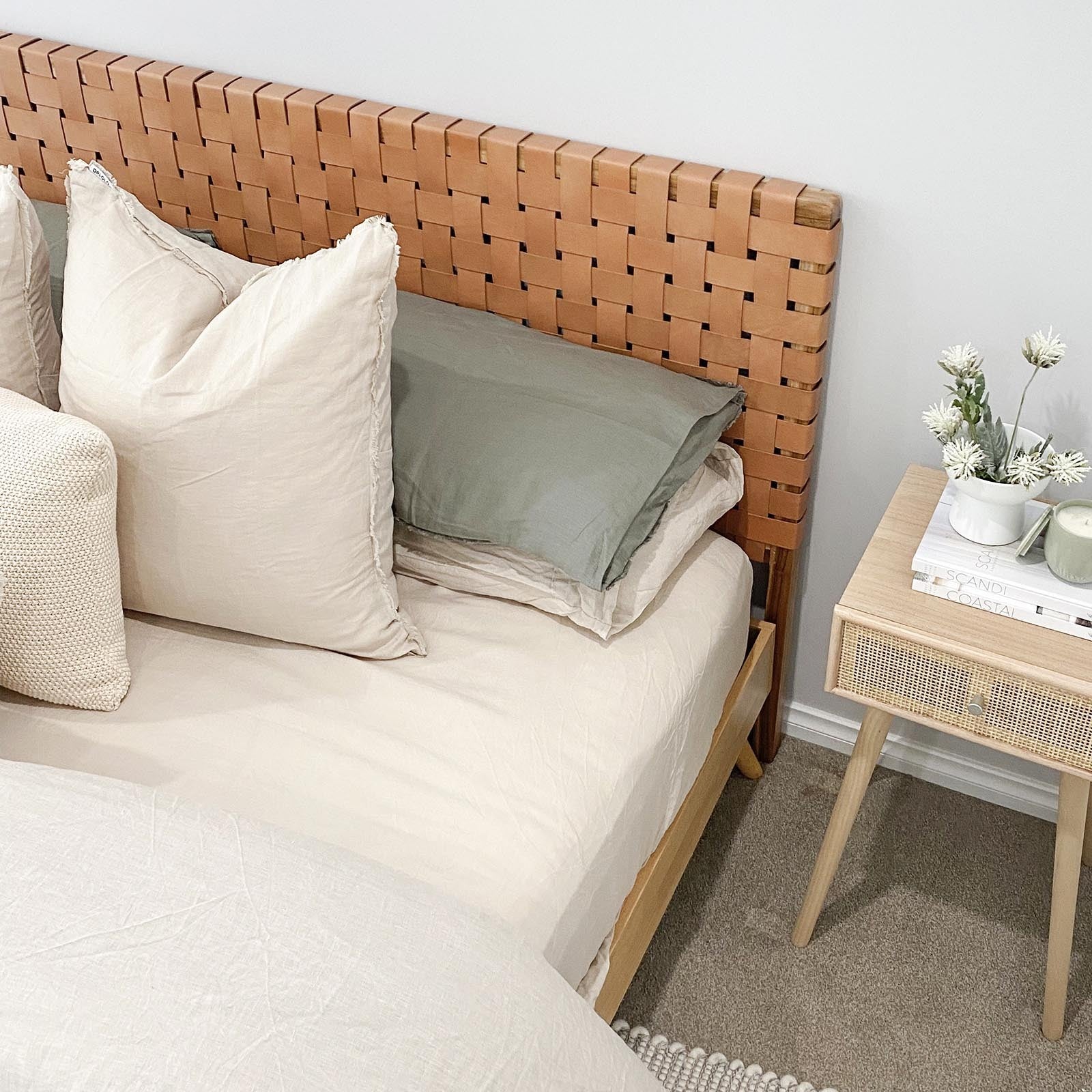 Side wiew of a scandinavian strap woven leather headboard highlighting its depth and craftsmanship king headboard.