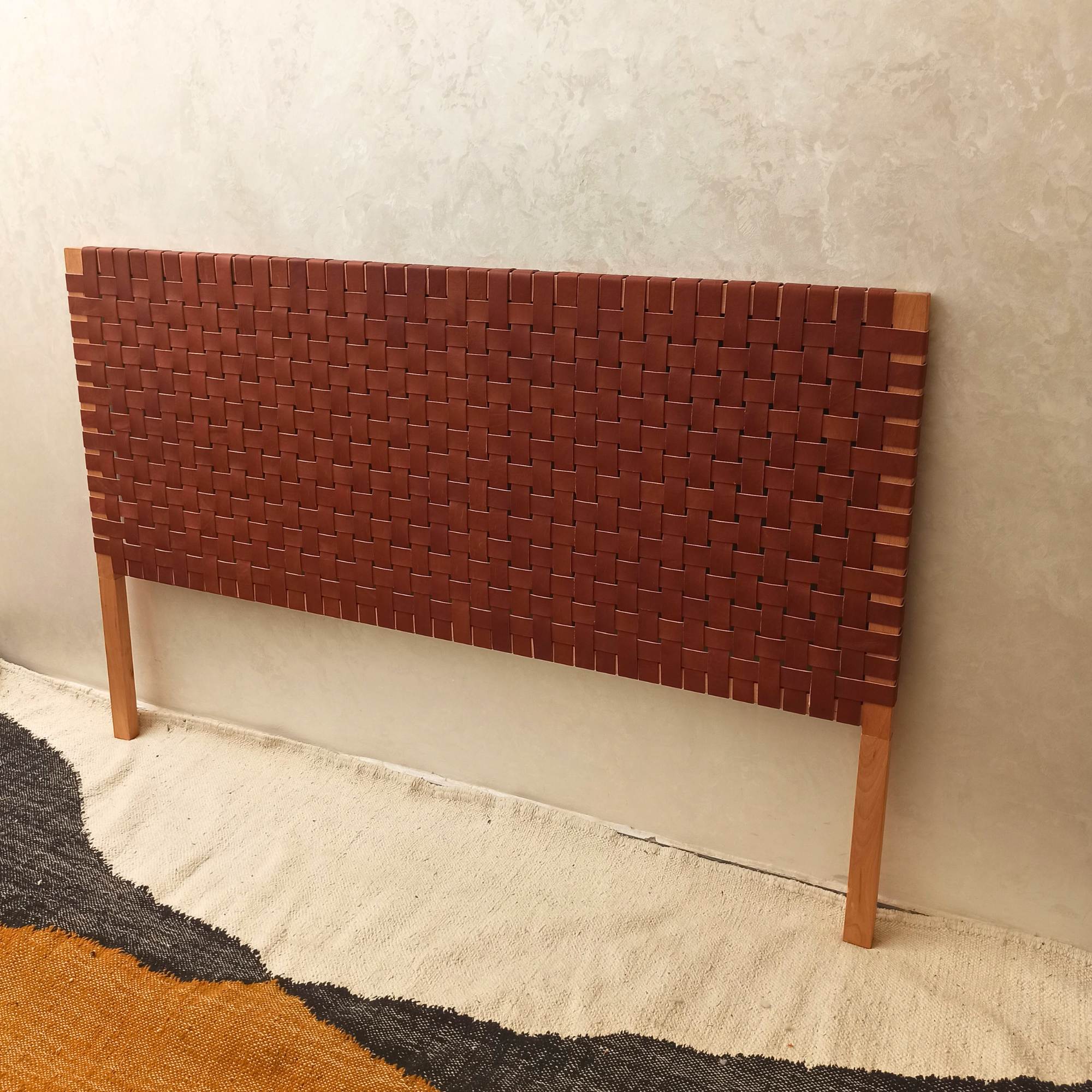 Unique Queen leather headboard by Artihandmade®, a bedroom centerpiece.