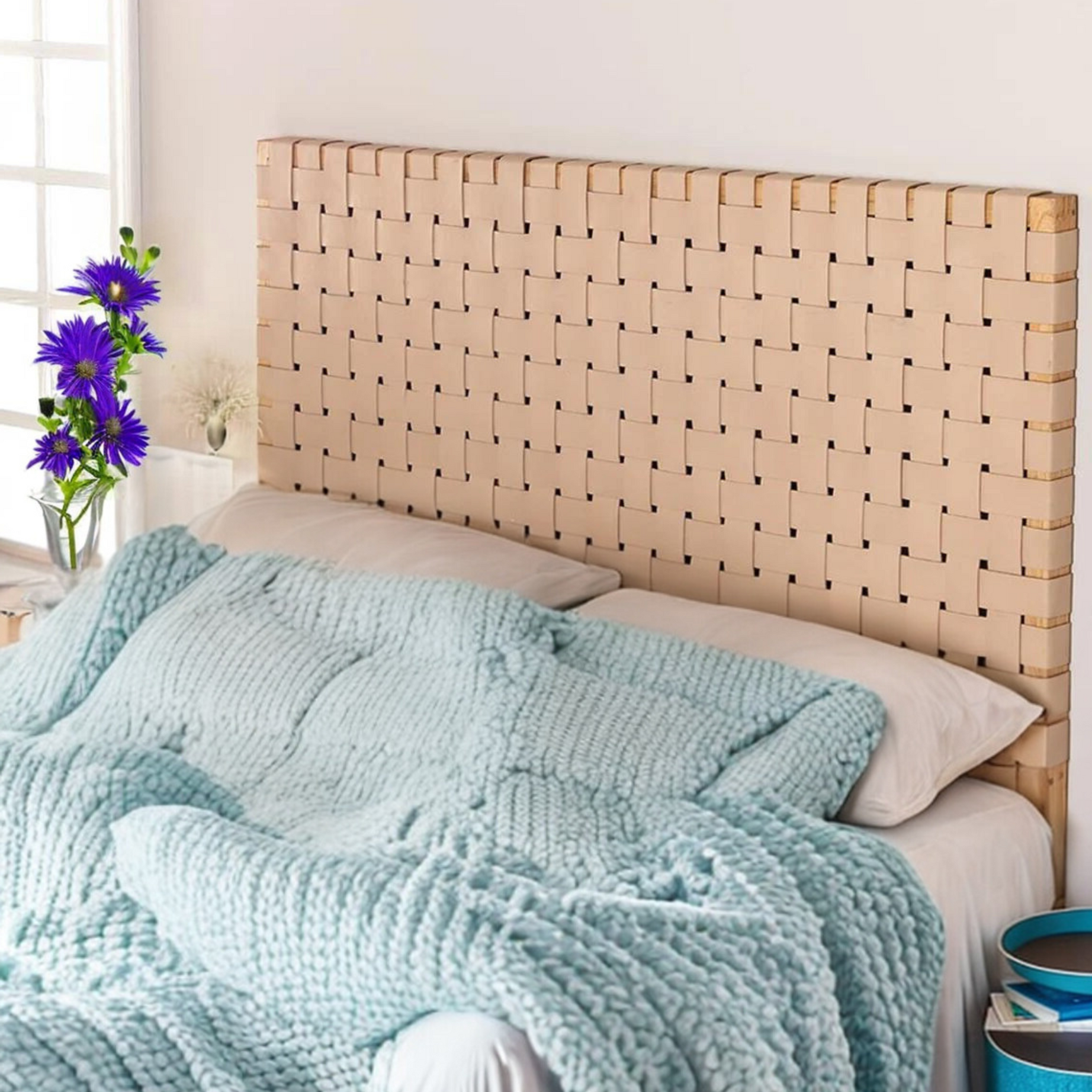 Side profile of an artisan strap woven leather headboard highlighting its bespoke craftsmanship.