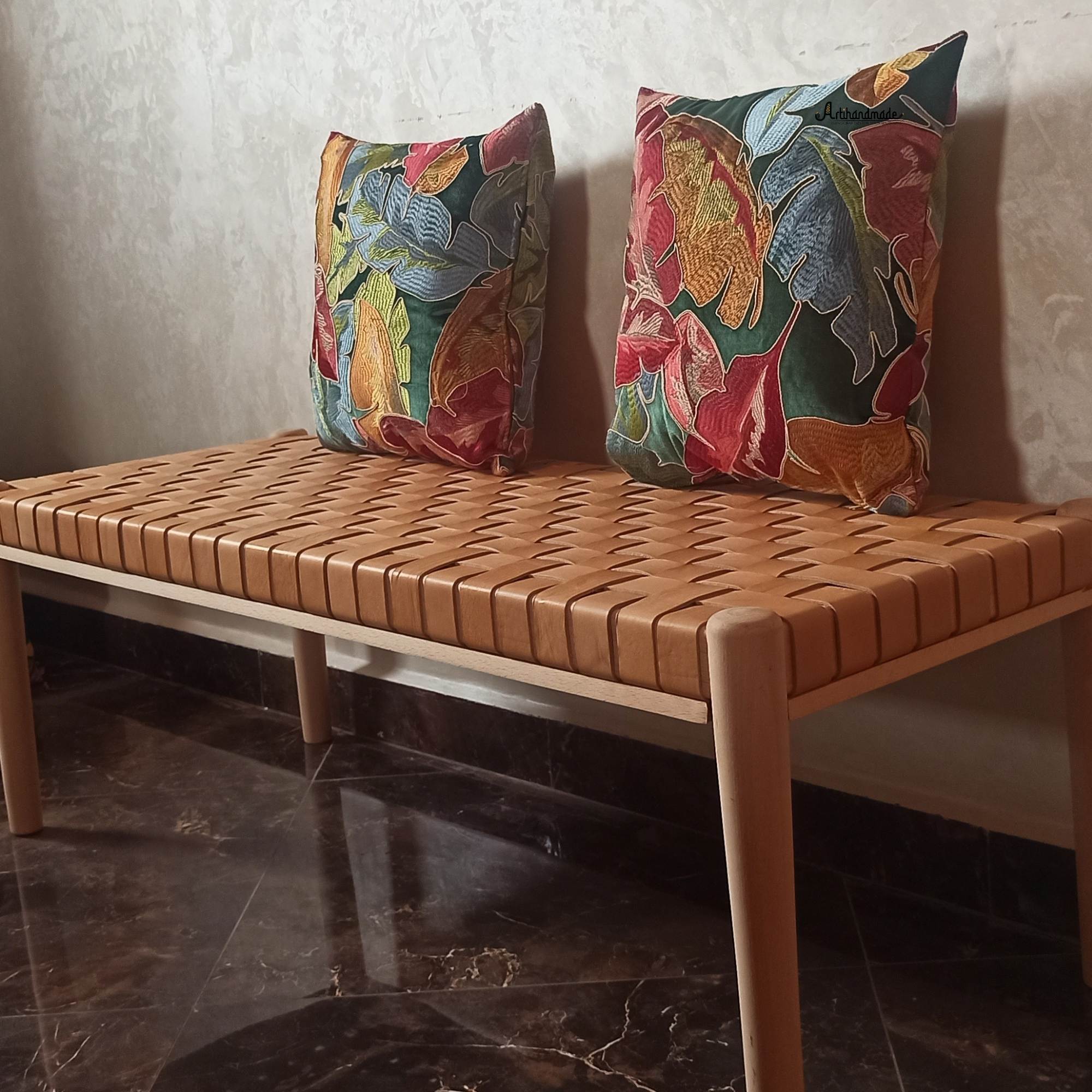 Close-up of Helga Entryway Bench showcasing the luxurious beige strap leather upholstery