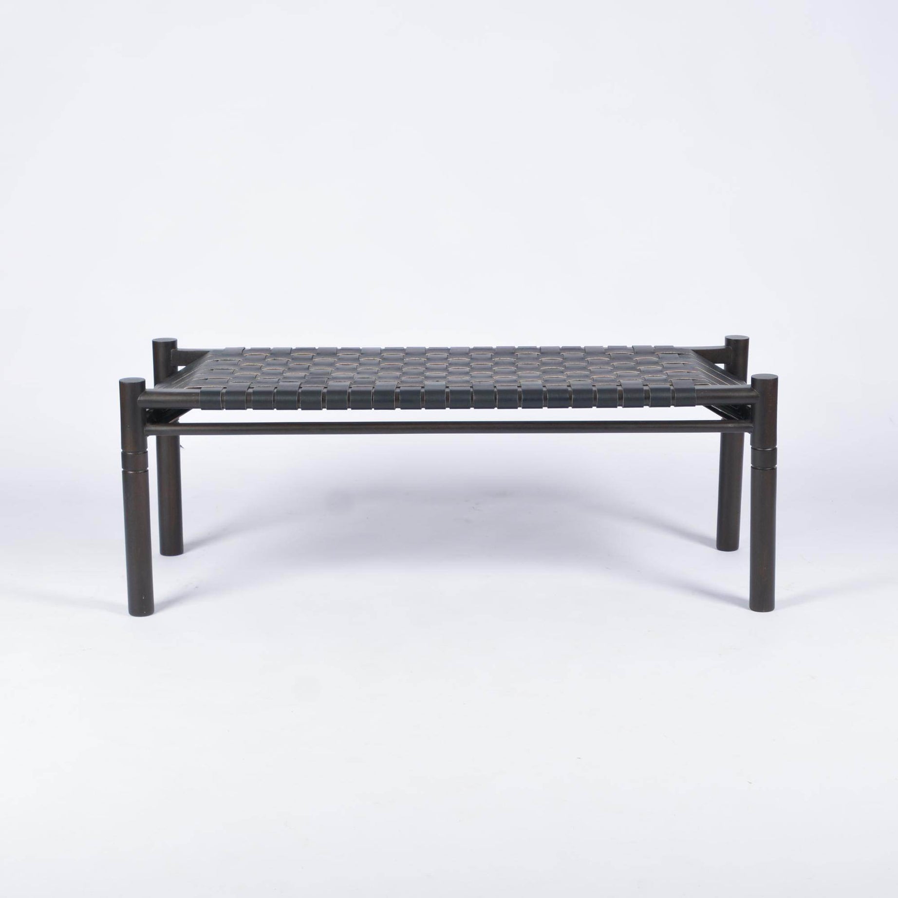 Black teak wood bench with black strap leather on a white background