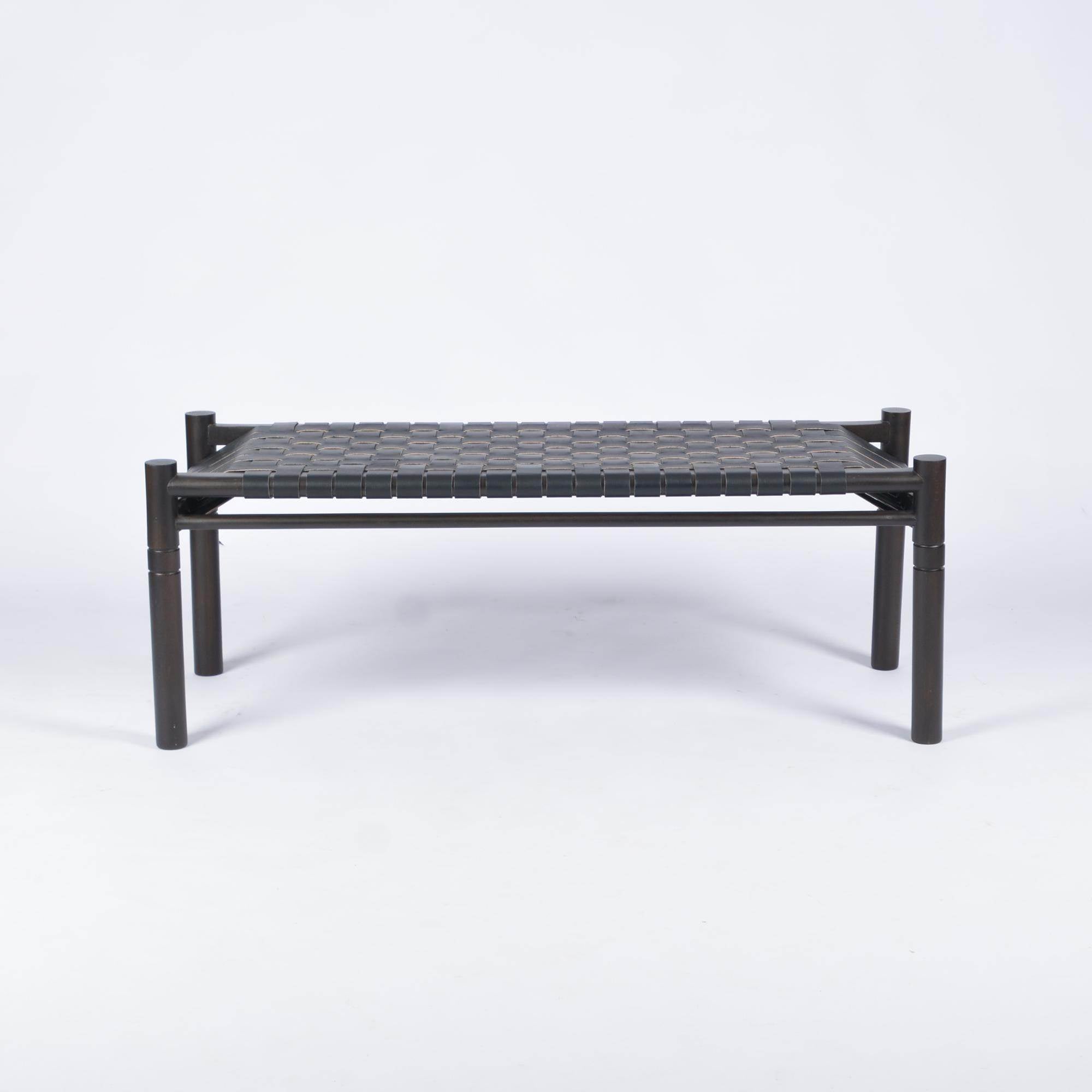 Black teak wood bench with black strap leather on a white background