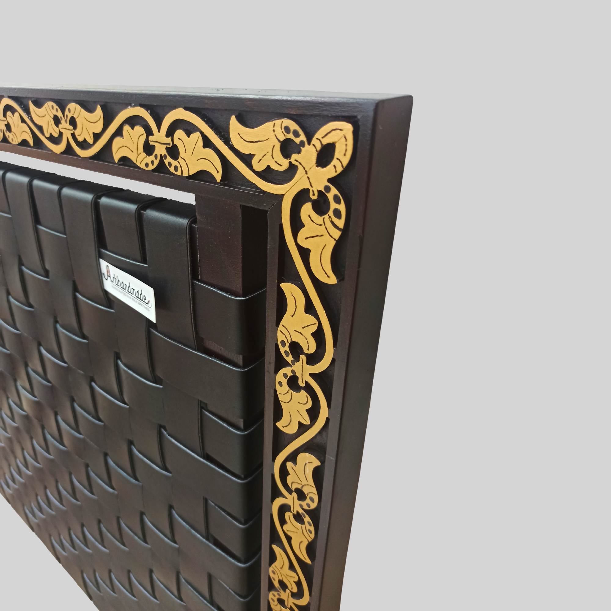 Leather headboard shown with neutral bedding and soft lighting