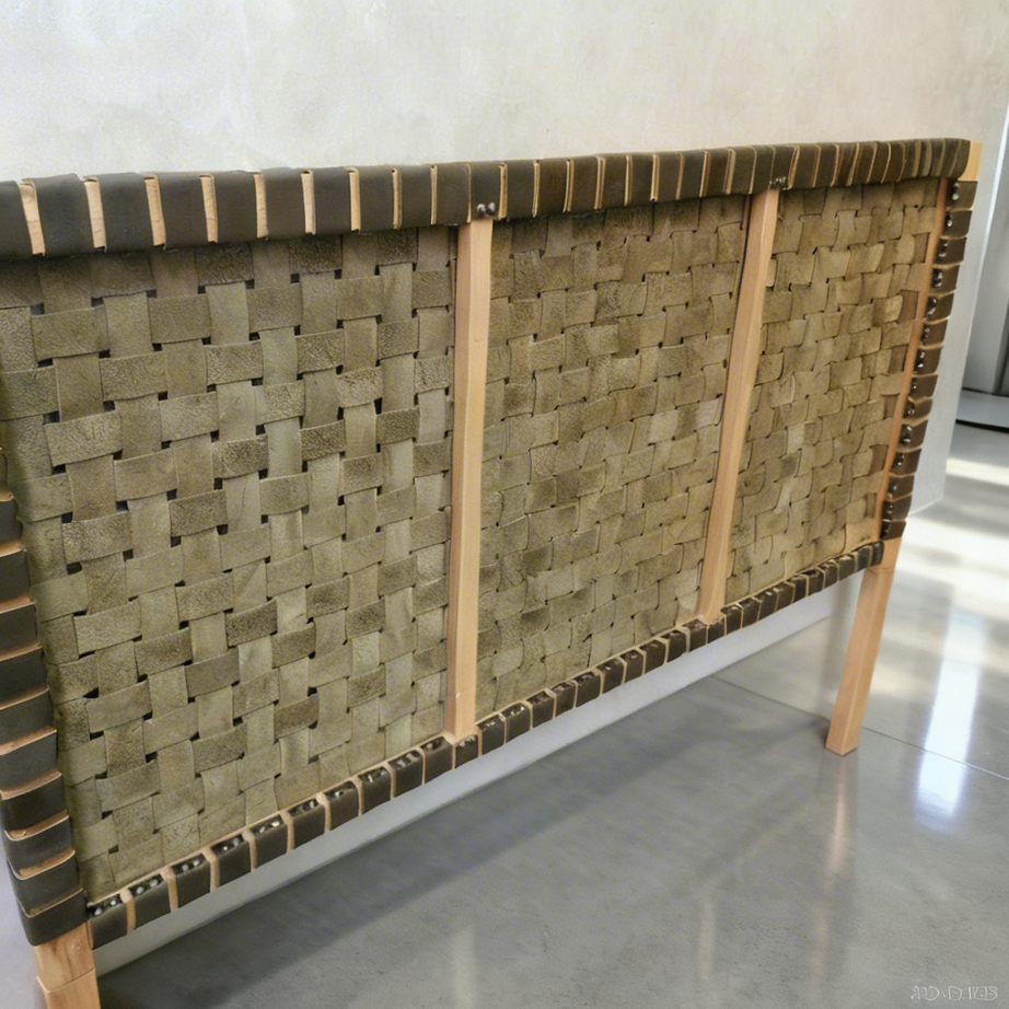 Woven headboard with wooden frame on a light gray floor